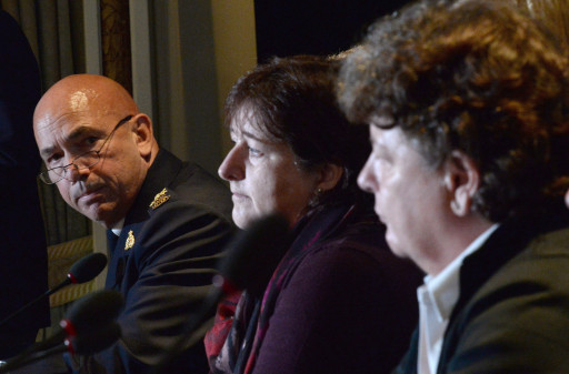 RCMP commissioner Bob Paulson, left, answers a question during a news conference, as plaintiffs Janet Merlo, centre, and Linda Davidson look on, in Ottawa Thursday, Oct. 6, 2016. Paulson has apologized to hundreds of current and former female officers and employees for alleged incidents of bullying, discrimination and harassment.