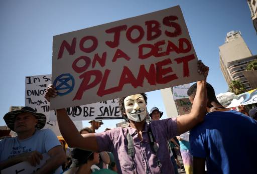 Students take part in a global protest against climate change in Cape Town, South Africa, March 15, 2019.
